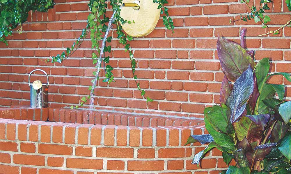 K&K falazókő, téglavörös habarcsfugával K&K falazókő, téglavörös habarcsfugával