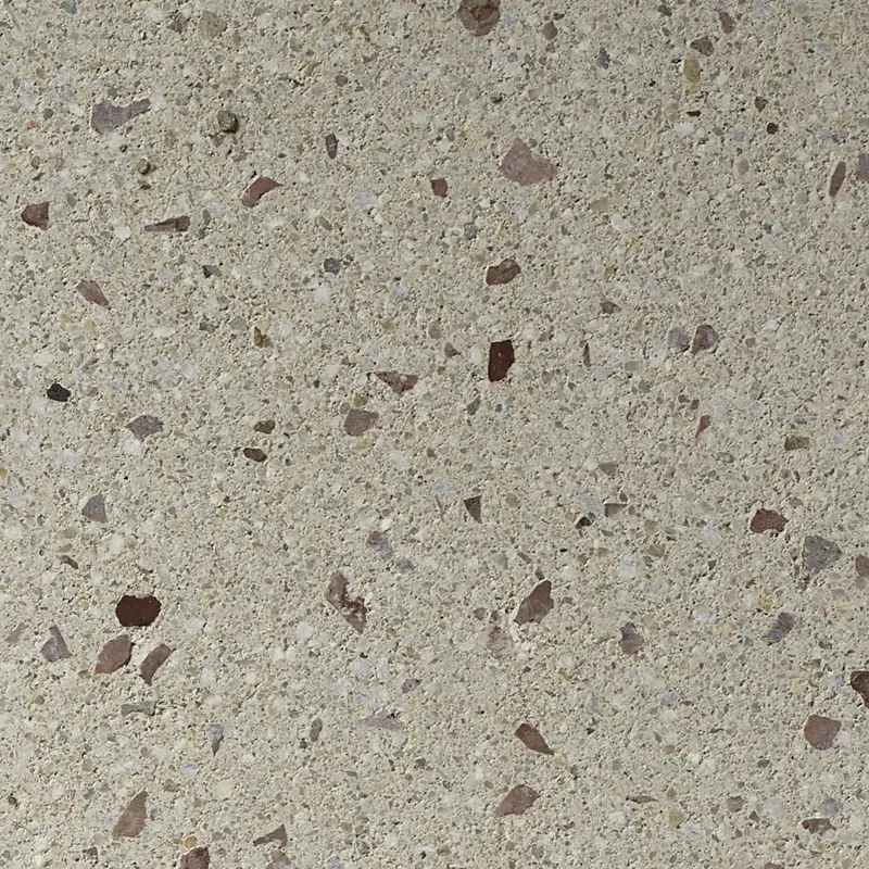 Világosszürke árnyalatú Creazzo felület durva, vöröses szemcsékkel, terrazzo hatású megjelenéssel, Friedl Steinwerke.